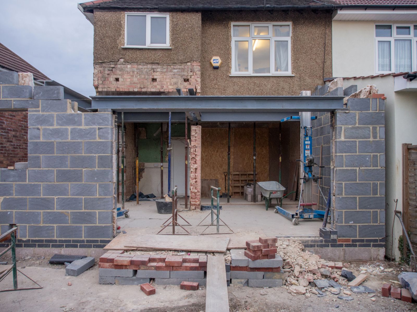 Rear extension in progress on a London semi, steels in and blockwork up