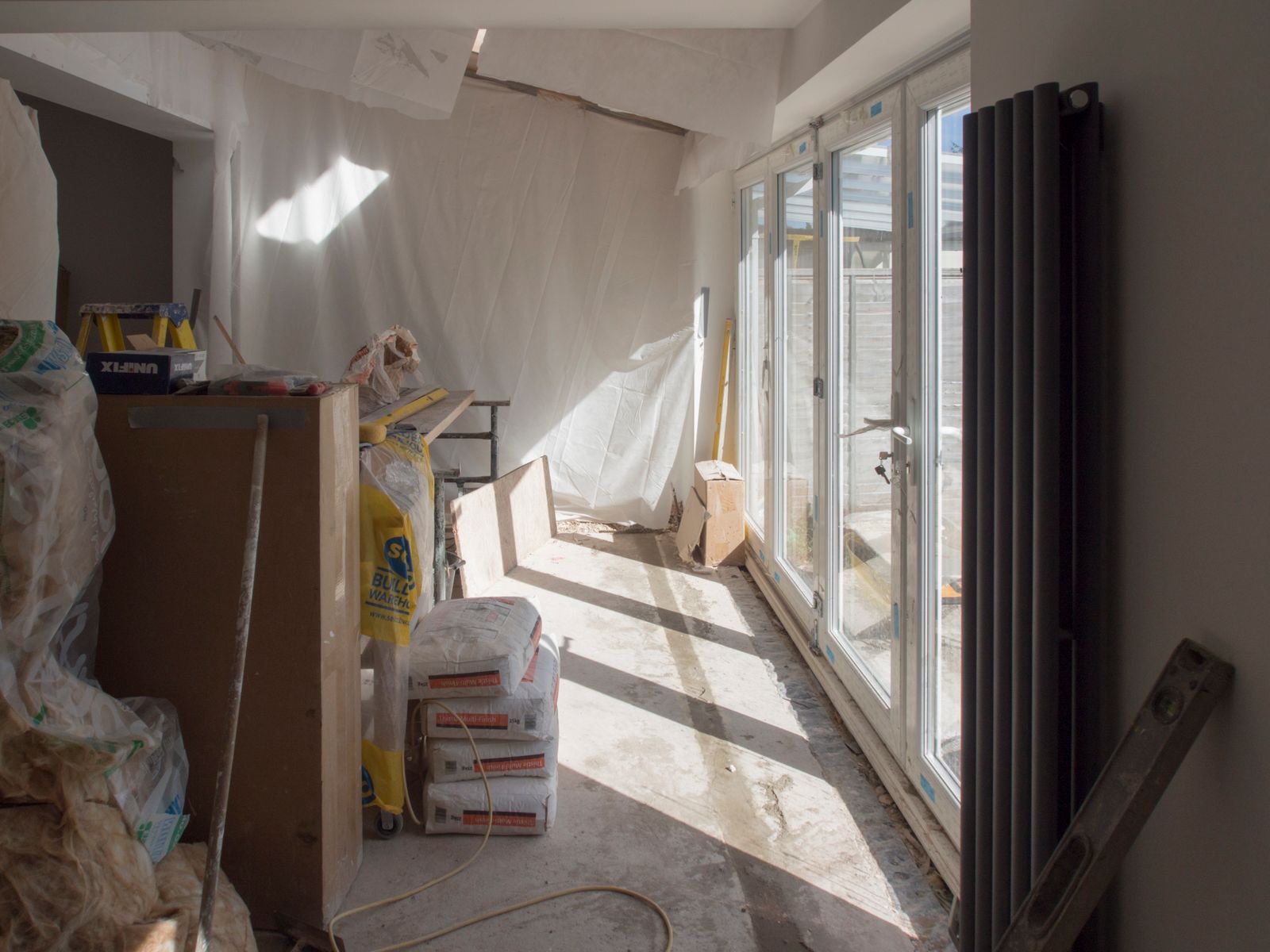 Extension interior with bifold doors at second fix