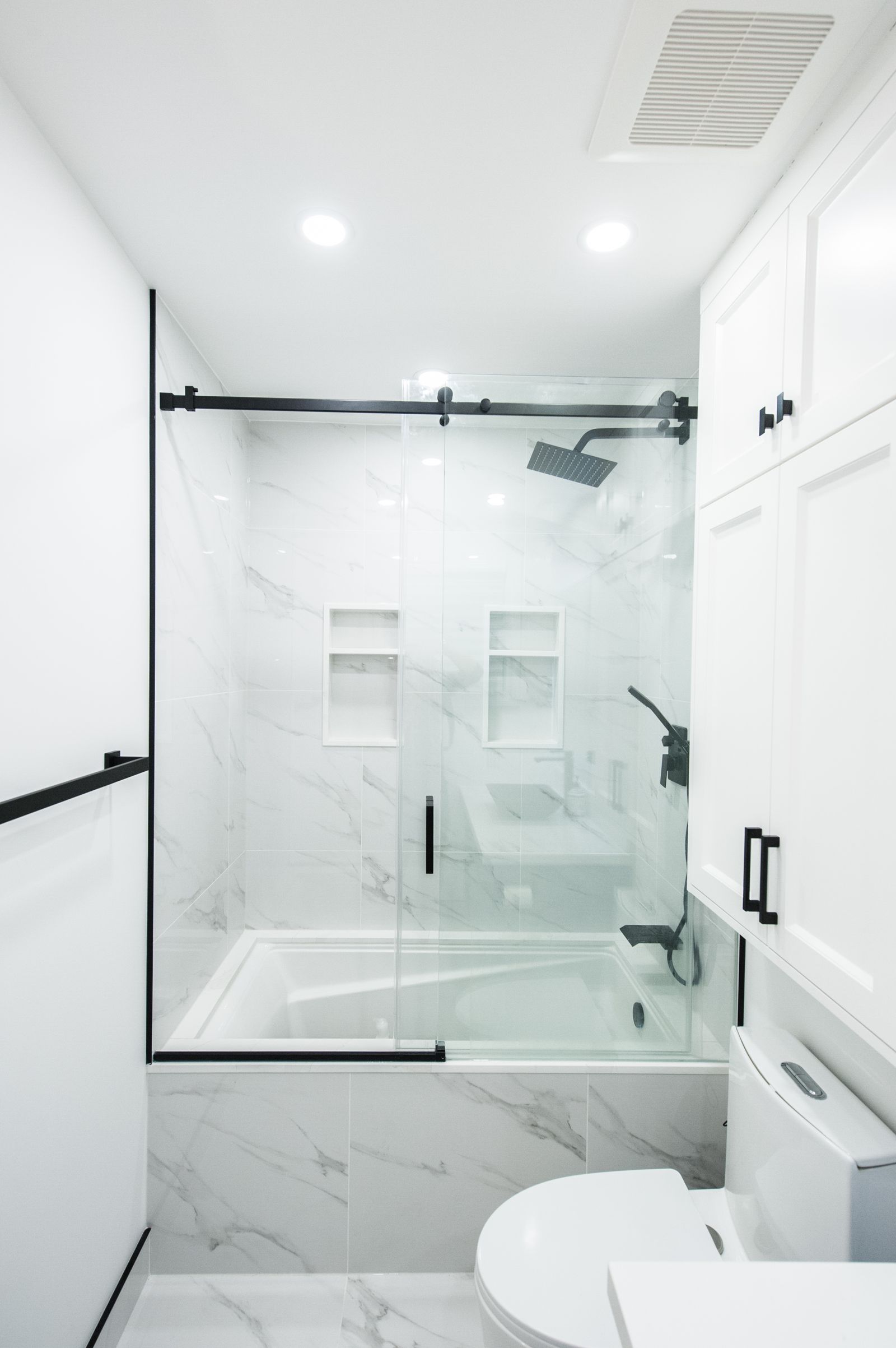 Finished bathroom with black fittings